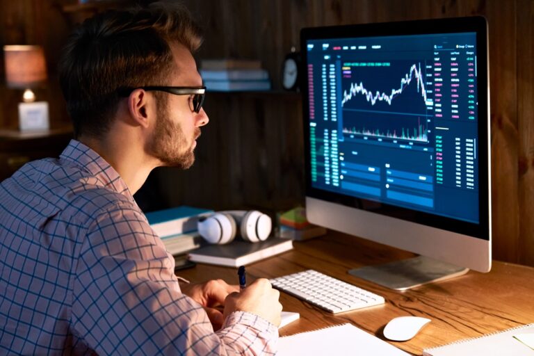 business-man-trader-looking-at-pc-analyzing-financ-2021-09-02-08-37-31-utc-1-2048x1366